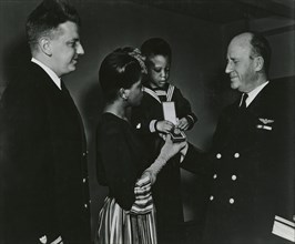 Mrs. Charles W. David, Jr.; African American widow and her three-year-old son, Neil..., 1939 - 1945. Creator: United States Coast Guard.