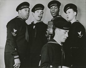 Group photograph of the U.S. Coast Guard Quartet members while singing, New York, N.Y., 1939 - 1945.