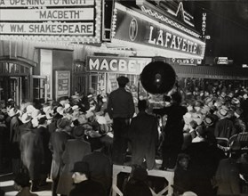Crowds outside the Lafayette Theatre in Harlem at the opening of "Macbeth", 1936.