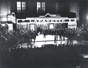 Crowd outside the Lafayette Theatre, in Harlem, at the opening of "Macbeth" produced..., 1936. Creator: Federal Theatre Project.
