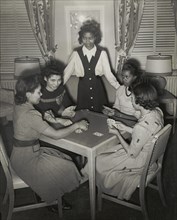Government hotel for Negro women war workers; A group of young war worker..., 1942-1943. Creator: Roger Smith.
