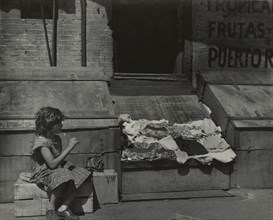 Park Avenue - Young girl selling clothes on the street, East Harlem, New York City, 1947 - 1951.