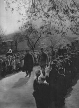 'Printemps d'Alsace; les ecoliers d'un village ranges sur le passage du President de la.... ', 1916. Creator: Unknown.