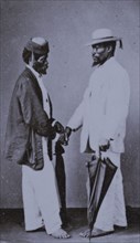 Men shaking hands, Brazil, 1890 (Inferred). Creator: Unknown.