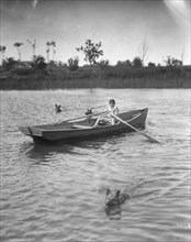 Lewisohn, Walter, Master, in a rowboat, 1926? Creator: Arnold Genthe.