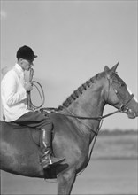 Unidentified person on a horse, between 1911 and 1942. Creator: Arnold Genthe.