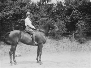 McCulloch, Mrs., daughter of, on horseback, 1929 June 13. Creator: Arnold Genthe.