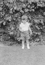 Javits, Benjamin, child of, standing outdoors, 1933 July. Creator: Arnold Genthe.