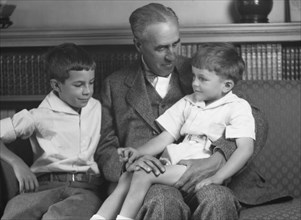 Twichell Mr., and sons, portrait photograph, 1925 Nov. 19. Creator: Arnold Genthe.