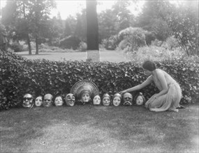 Display of masks made by W.T. Benda, not before 1925 Sept. 20. Creator: Arnold Genthe.