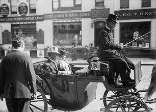 John Lind, Governor of Minnesota, in Carriage with Mrs. Lind, 1914. Creator: Harris & Ewing.