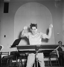Portrait of Leonard Bernstein, Carnegie Hall, New York, N.Y., 1946. Creator: William Paul Gottlieb.