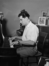 Portrait of Leonard Bernstein in his apartment, New York, N.Y., 1946. Creator: William Paul Gottlieb.