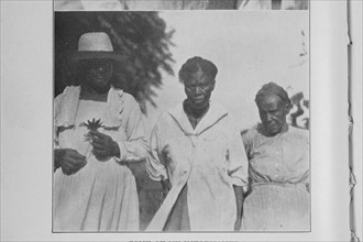 Some of my informants; [Note the "mojo" around the neck of the center figure], 1926. Creator: Unknown.