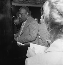 Portrait of James P. (James Price) Johnson, Riverboat on the Hudson, N.Y., ca. July 1947. Creator: William Paul Gottlieb.