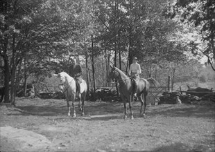 Rothbart, Albert, Mr., on horseback, with unidentified woman on horseback, between 1920 and 1935. Creator: Arnold Genthe.