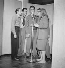 Portrait of Dave Lambert, Jerry Duane, Wayne Howard, Jerry Packer, and Margaret Dale, N.Y., 1947. Creator: William Paul Gottlieb.