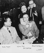 Portrait of Billy Taylor, Sylvia Syms, William P. Gottlieb, and Ahmet M. Ertegun, N.Y., ca. 1947. Creator: Delia Potofsky Gottlieb.