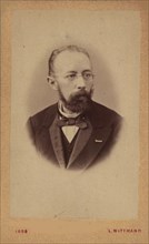 Portrait of the librettist and composer Franz Friedrich Richard Genée (1823-1895), 1869. Creator: Photo studio Leopold Wittmann.
