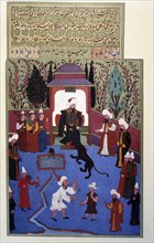 Osman I, a lion brought by a tamer licks his boots, Turkish miniature in the 'Book...(1584 - 1589). Creator: Unknown.