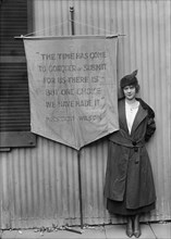 Pauline Floyd, with Banner, 1917. Creator: Harris & Ewing.