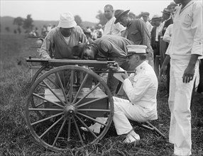 Marine Corps Rifle Range, Winthrop, Md. - Gen. Barnett Testing Colt's Automatic Machine Gun, 1917. Creator: Harris & Ewing.