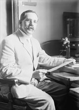 Charles Frederick Marvin, Chief, Weather Bureau, at Desk, 1916. Creator: Harris & Ewing.