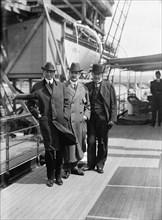 William Gibbs McAdoo, David Franklin Houston, Albert Sidney Burleson, Target Practice, 1913. Creator: Harris & Ewing.
