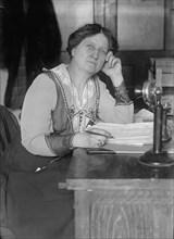 Mrs. Martha Nelson Mccam at Desk, 1918. Creator: Harris & Ewing.
