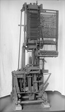 Mergenthaler, Ottmar, 2nd Linotype Machine with Band, Invented By Him; 3rd Design He..., 1917. Creator: Harris & Ewing.