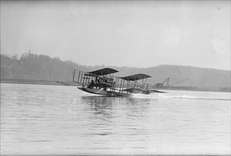 Richardson Tandem Biplane Hydroplane Taking Off On Potomac, April, 1916. Creator: Harris & Ewing.