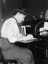 Miss Carolyn B. Sheldon at Desk, 1914. Creator: Harris & Ewing.