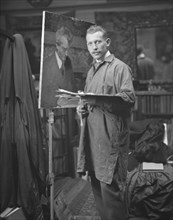Williamson, J.M., Mr., painting an Arnold Genthe portrait, portrait photograph, not before 1915. Creator: Arnold Genthe.