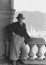 Hauptmann, Gerhart, standing outdoors, 1938 Creator: Arnold Genthe.
