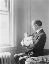 Kennerley, Mr., and Norman baby, portrait photograph, 1925 July 22. Creator: Arnold Genthe.