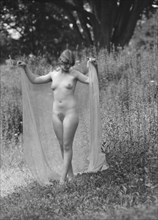 Olson, Margaret, Miss, standing outdoors, 1924 July. Creator: Arnold Genthe.