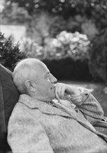 Clucas, E.W., seated outdoors, 1931 June 14. Creator: Arnold Genthe.