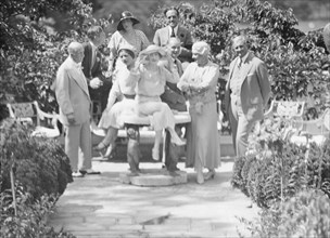 Gossler, Philip, Mrs., group, outdoors, not before 1929. Creator: Arnold Genthe.