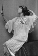 Namara-Toye, Mme., portrait photograph, 1912. Creator: Arnold Genthe.