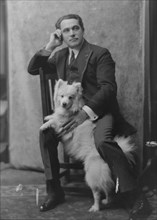 Spirescu, Steraskon, Mr., with dog, portrait photograph, 1917 Mar. 1. Creator: Arnold Genthe.