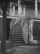 Stairway to the first floor of a building, [16 Charlotte Street], Charleston, South..., c1920-1926. Creator: Arnold Genthe.
