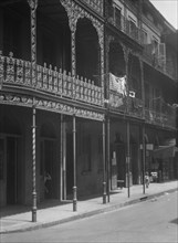 Street scene in the French Quarter, New Orleans, between 1920 and 1926. Creator: Arnold Genthe.