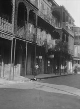Street scene, New Orleans, between 1920 and 1926. Creator: Arnold Genthe.