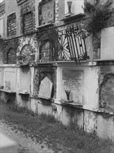 Wall tombs of the old St. Louis Cemetery, New Orleans, between 1920 and 1926. Creator: Arnold Genthe.