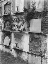 Wall tombs of the old St. Louis Cemetery, New Orleans, between 1920 and 1926. Creator: Arnold Genthe.