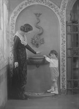 Rosen, Walter T., Mrs., and son, portrait photograph, 1919 Feb. 5. Creator: Arnold Genthe.