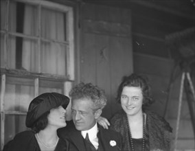 Arnold Genthe with two women friends on the porch of his bungalow in Long Beach, N.Y., c1911-c1942. Creator: Arnold Genthe.