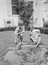 Children of Victor Harris, outdoors, 1932. Creator: Arnold Genthe.