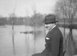 Unidentified man, seated outdoors, between 1896 and 1942. Creator: Arnold Genthe.