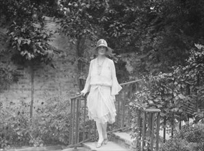 Unidentified woman, standing outdoors, c1920s. Creator: Arnold Genthe.